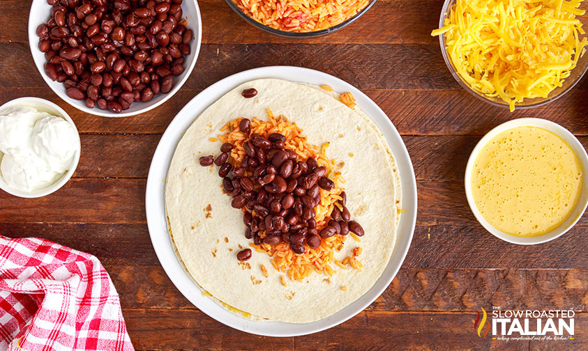 overhead: rice and beans on stacked tortillas