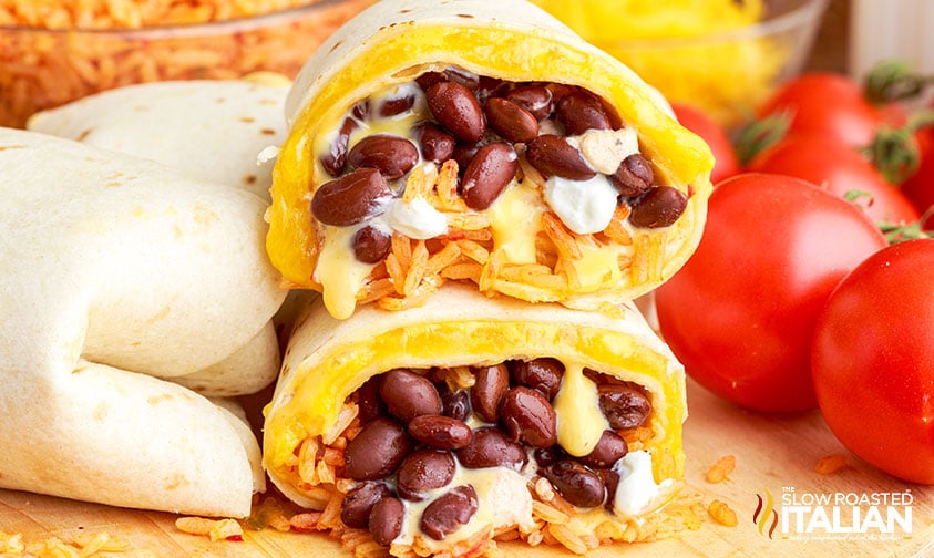 closeup: black bean quesarito sliced in half to show fillings