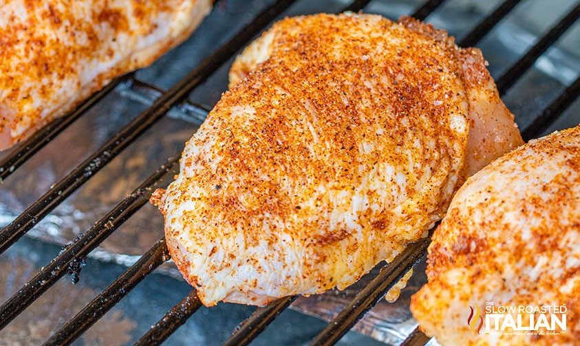closeup: chicken thighs on the smoker