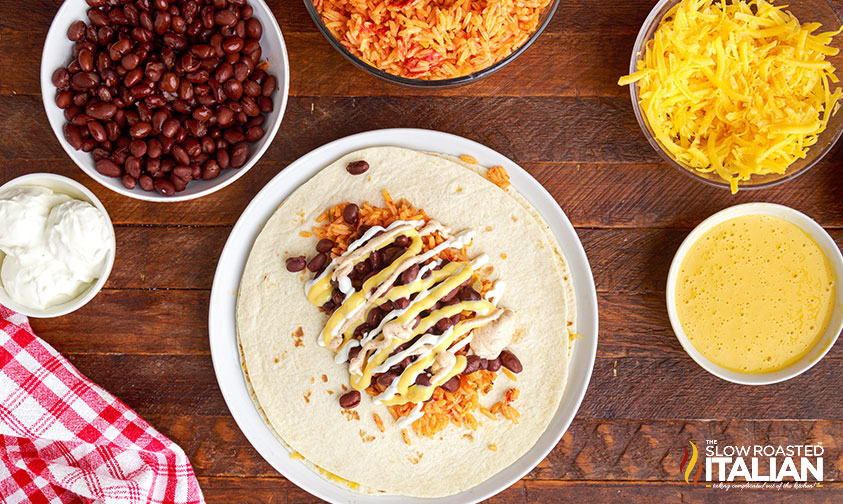 overhead: sauces added to quesarito recipe