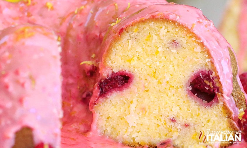 closeup: showing inside of raspberry lemonade cake with icing
