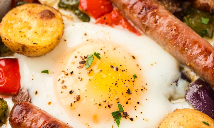 closeup of sheet pan fried eggs and veggies
