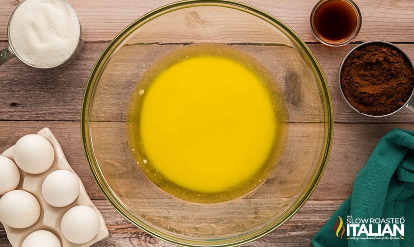 melted butter in large mixing bowl