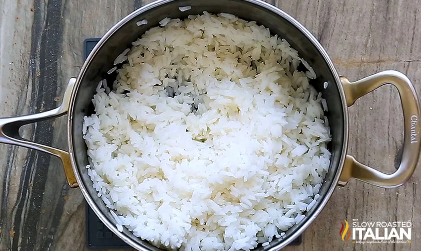 fluffed, cooked cilantro lime rice in saucepan