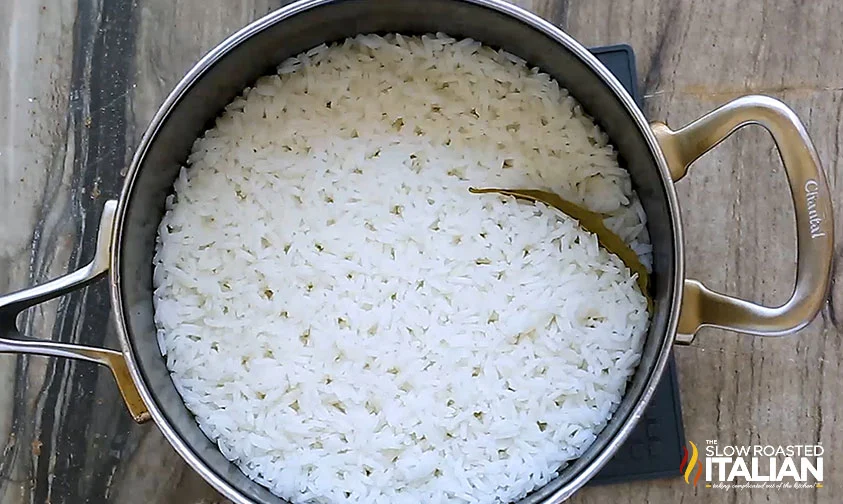 cooked rice with bay leaf in pot