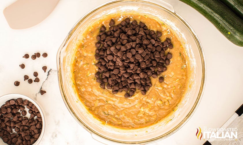 adding chocolate chips to zucchini bread ingredients