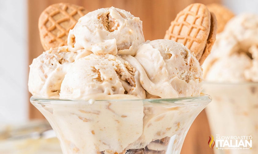 4 scoops of nutter butter ice cream in a serving glass