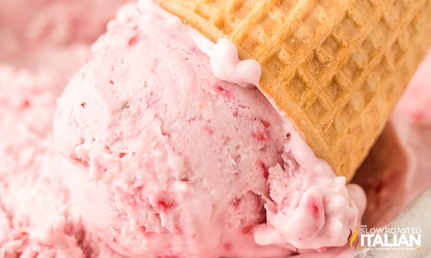 closeup of no churn raspberry ice cream in a cone