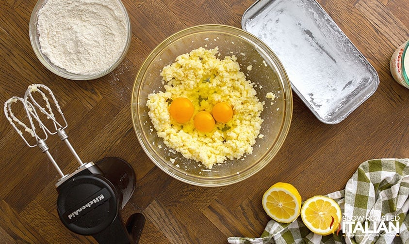 3 egg yolks in bowl of creamed butter and sugar