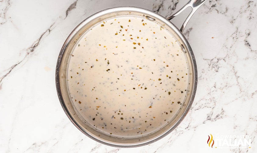 homemade alfredo sauce in a saucepan