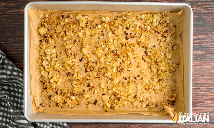 roasted onion in a baking pan
