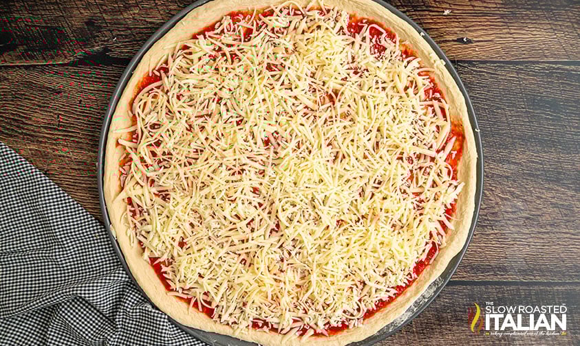cheese sprinkled on costco copycat pizza