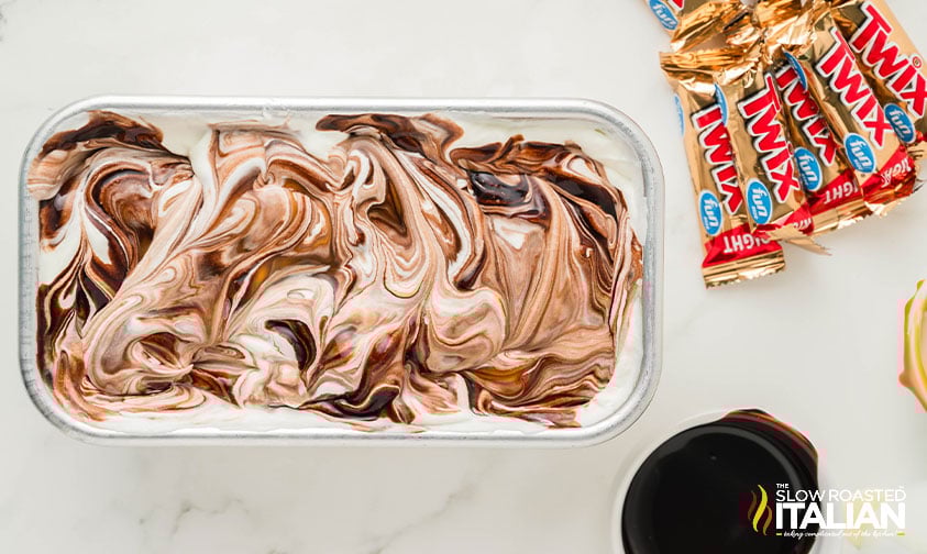 swirled chocolate in twix ice cream mixture