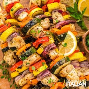 closeup of chicken and vegetables skewers