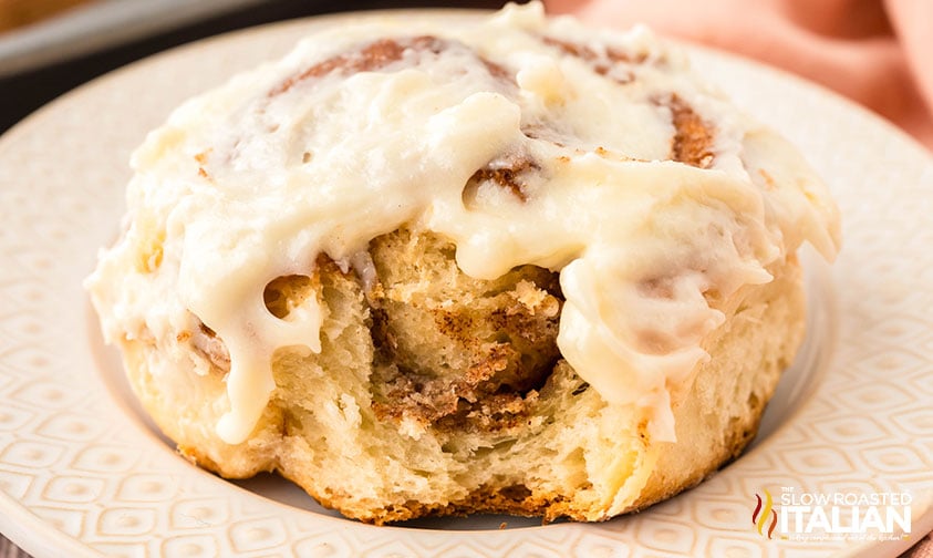 bite take out of a sheet pan cinnamon roll