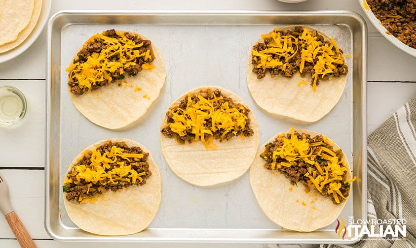 assembling tacos on a sheet pan