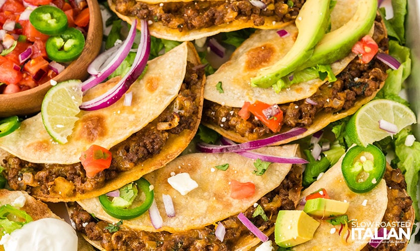 crispy baked tacos on a sheet pan