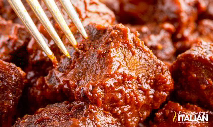 close up: fork spearing a piece of poor mans burnt ends