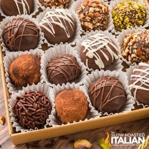 closeup of decorated chocolate truffles in a box