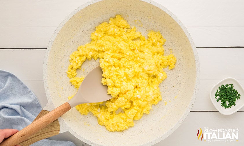 cooked creamy cottage cheese eggs in a skillet