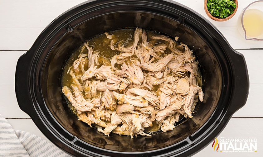 shredded chicken breasts in a crockpot