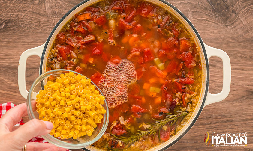 adding pasta to pasta fagioli recipe