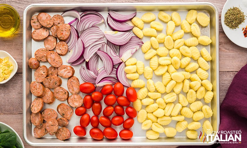 ingredient for gnocchi dinner on a sheet pan