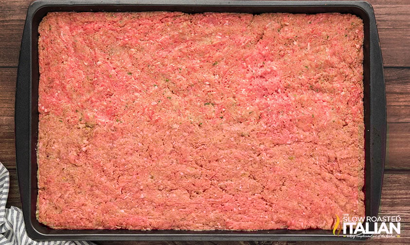 best meatloaf mixture pressed into a sheet pan