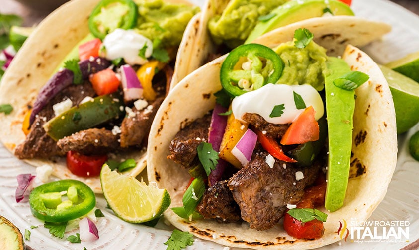 sheet pan steak fajitas recipe in tortillas