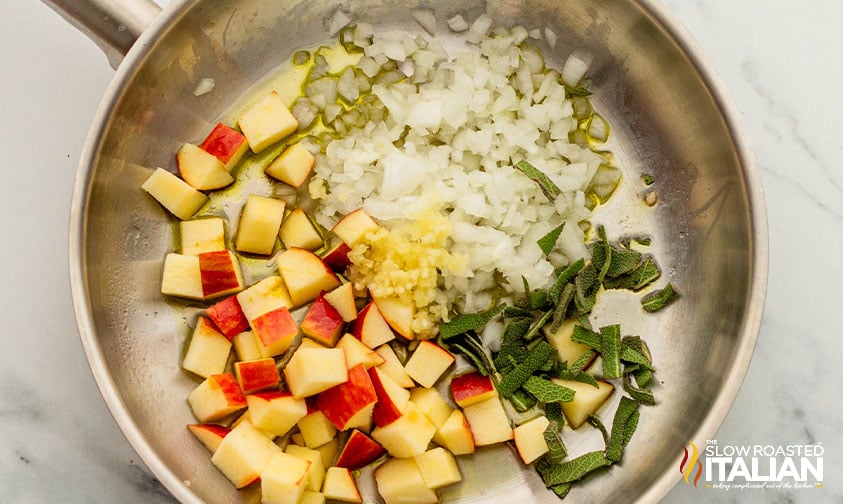 onion, apple, sage and garlic in a large skillet