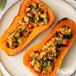 slice stuffed butternut squash on a plate