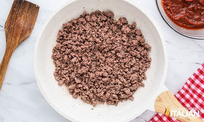 cooked ground beef in a skillet