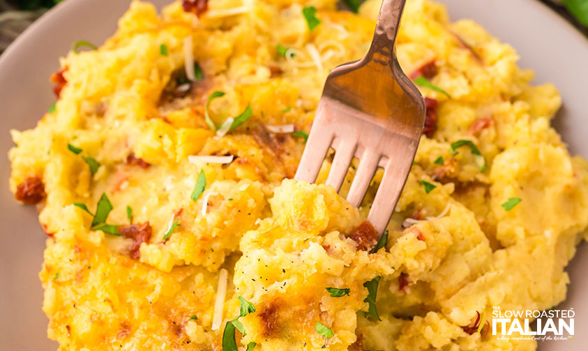 closeup of baked mashed potatoes on a plate