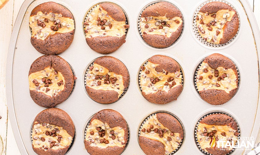 baked black bottom cupcakes in a muffin tin