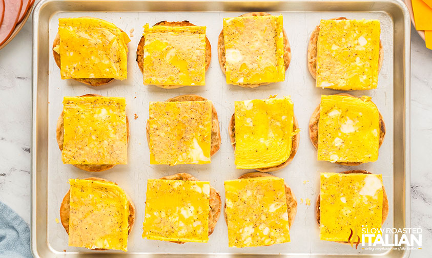 sliced baked eggs on english muffins