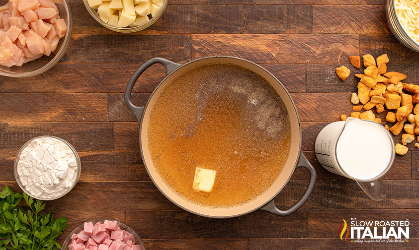 adding base ingredients for chicken cordon bleu soup recipe