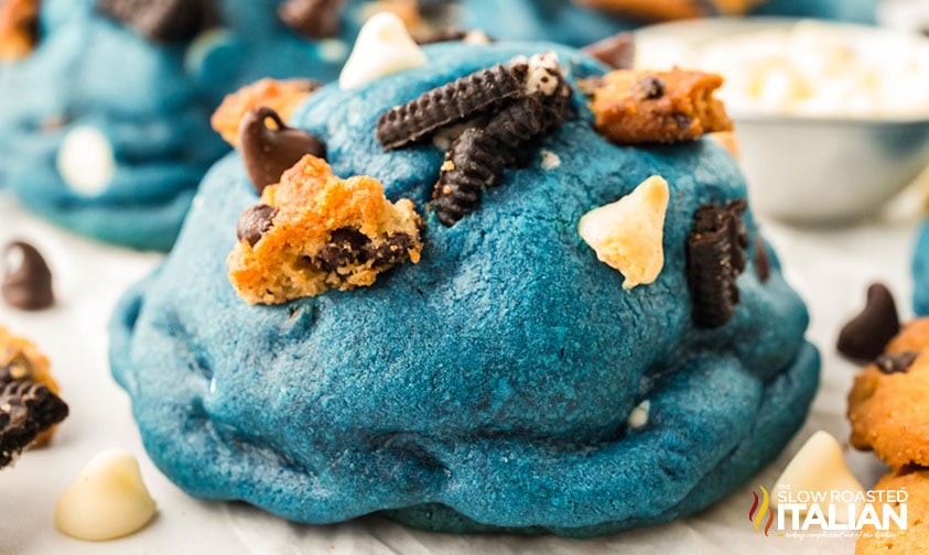 baked cookie monster cookies with pieces of chocolate chip cookie and oreos on top