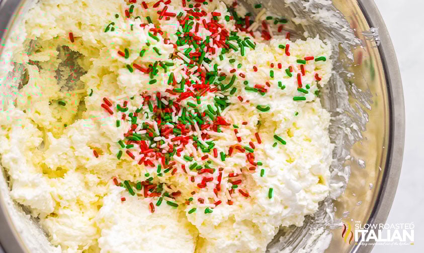adding sprinkles to cool whip candy mixture