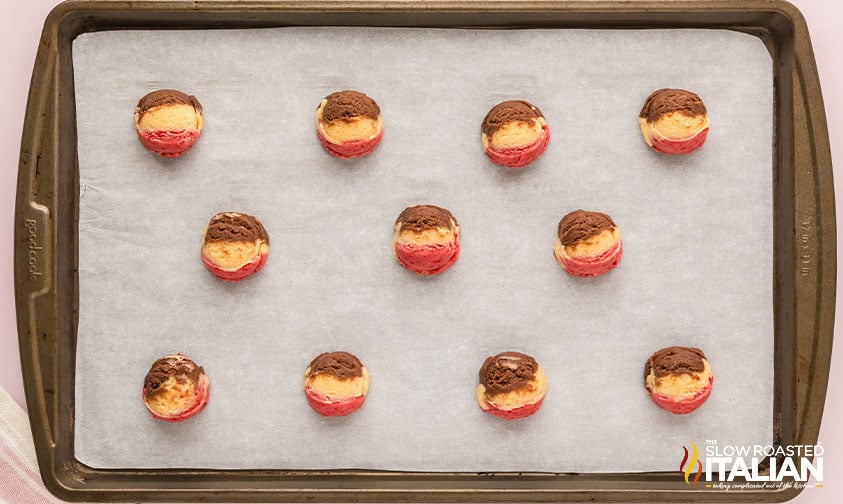 neapolitan cookie dough scoops n a baking sheet