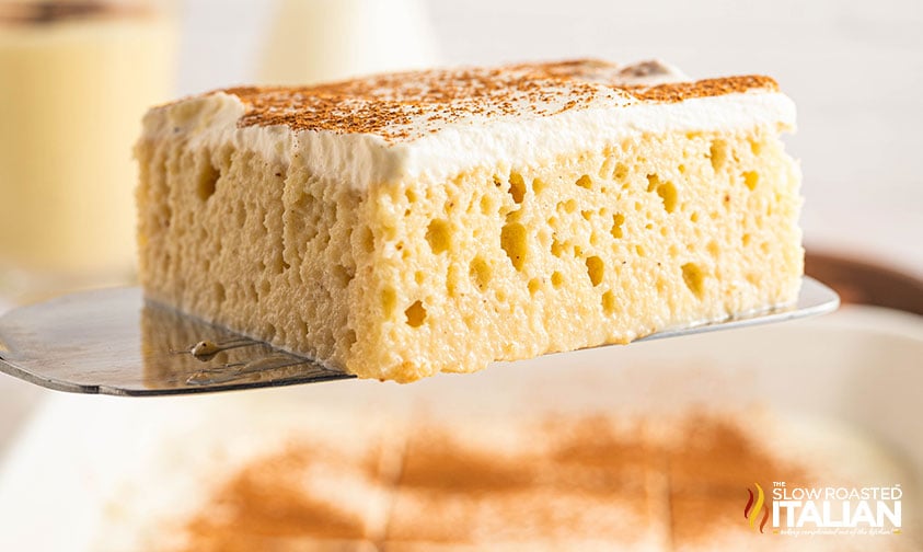 closeup of a slice of eggnog tresh leches cake