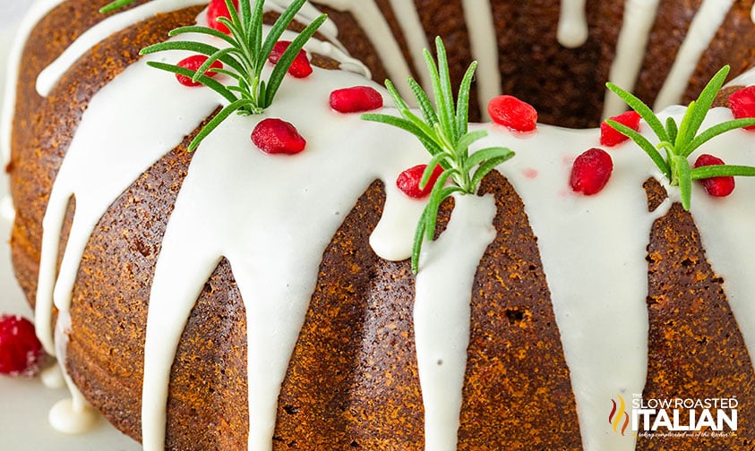 closeup of gingerbread bundt cake with vanilla glaze