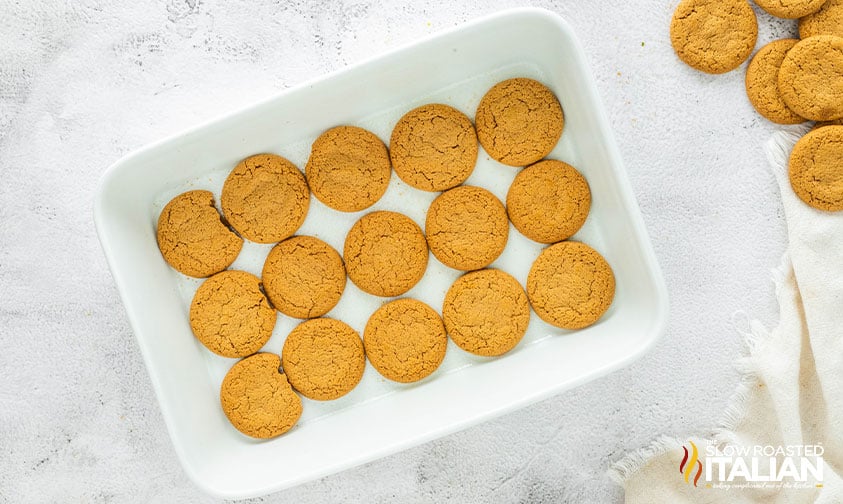 layering gingersnaps for gingerbread layer cake