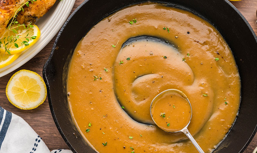 making gravy for lemon roasted chicken