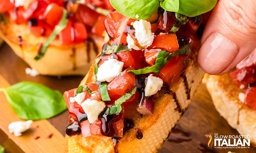 closeup of easy bruschetta drizzled with balsamic vinegar
