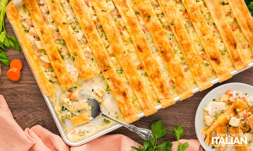 baked sheet pan chicken pot pie with a golden brown crust