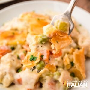 closeup of sheet pan chicken pot pie on a fork