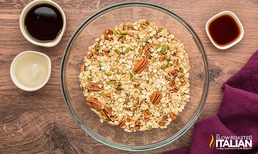 homemade granola ingredients mixed in a large bowl