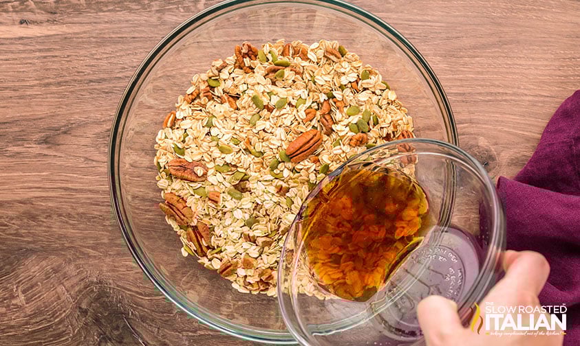 adding maple syrup, coconut oil, and vanilla mixture to dry ingredients