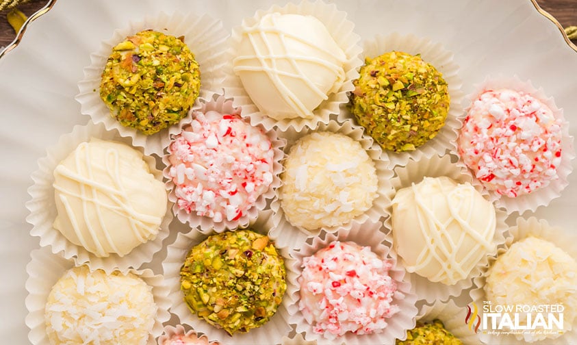 plate of white chocolate truffles with assorted toppings