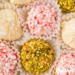 closeup of white chocolate truffles with assorted toppings